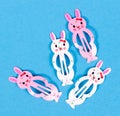 Bunny hairclips isolated on a blue background