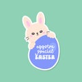 Bunny Peeking Over Blue Egg with Eggstra Special Easter Text Royalty Free Stock Photo