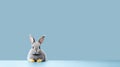 Minimalist Grey Rabbit On Blue Table: Vibrant Stage Backdrop