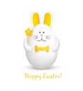 Bunny shaped Easter Egg. Cute Easter decoration in the form of a figurine of a white rabbit with a yellow bow tie, holding a