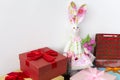 Bunny Tilda is sitting on gifts Royalty Free Stock Photo