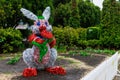 Bunny from tinsel. Easter symbol. Background with selective focus and copy space