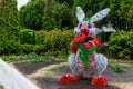 Bunny from tinsel. Easter symbol. Background with selective focus and copy space