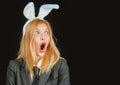 Bunny woman. Happy easter. Portrait of a happy woman in bunny ears winking. Easter bunny woman. woman with mask Royalty Free Stock Photo