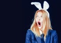 Bunny woman. Happy easter. Portrait of a happy woman in bunny ears winking. Easter bunny woman. Sexy woman with mask Royalty Free Stock Photo