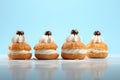 Buns with cream on a blue background. AI generative