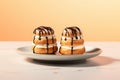 Buns with cream and chocolate icing in a plate on a yellow background. AI generative