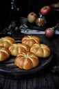 Buns in the form of a pumpkin, with apple stuffing