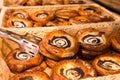 Buns with poppy seed curd filling in baskets in bakery Royalty Free Stock Photo