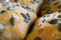 Buns with pumpkin seeds closeup. Royalty Free Stock Photo