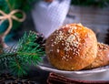 Buns with sesame on plate Royalty Free Stock Photo