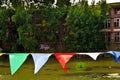 A bunting of colorful burgees flittering in the wind