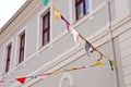 A bunting of colorful burgees flittering in the wind