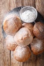 Bunuelos Mexican fritters golden, crispy-sweet, tortilla-like fritters are sprinkled with sugar close-up. Vertical top view Royalty Free Stock Photo