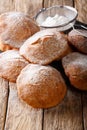 Bunuelos Mexican fritters sprinkled with powdered sugar close-up. vertical Royalty Free Stock Photo