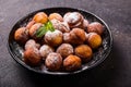 Bunuelos - traditional Colombian sweet deep fried pastry served with chocolate sauce Royalty Free Stock Photo