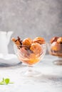 Bunuelos - traditional Colombian sweet deep fried pastry served with sweet sauce Royalty Free Stock Photo