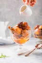 Bunuelos - traditional Colombian sweet deep fried pastry served with sweet sauce Royalty Free Stock Photo