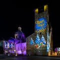 Buone Feste da Como - Christmas light show on facades of buildings in the central square Royalty Free Stock Photo