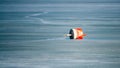 A buoy, is a floating device on the ice of a frozen lake. Emptiness, ice, loneliness, cold, hopelessness