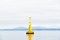 Buoy floating in Firth of Clyde for water depth warning