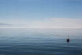 Buoy floats on Lake Geneva