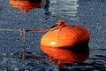 Buoy and water reflections Royalty Free Stock Photo
