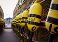 Buoys hanging on lobster traps Royalty Free Stock Photo