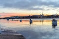 Buoys on the Neva river in the early morning with a gentle dawn