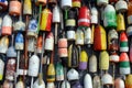 Buoys on the side of a beach shack Royalty Free Stock Photo