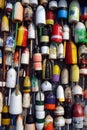 Buoys on the side of a beach shack Royalty Free Stock Photo