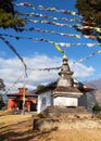 Bupsa gompa monastery and stupa with prayer flags