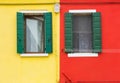 Burano, colorful walls of houses and two windows Royalty Free Stock Photo