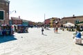 Burano island canal, colorful houses and boats, Venice Italy Europe