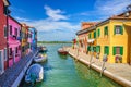 Burano island with colorful houses and narrow water canal