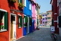 Burano Island. Fairytale street. Colorful houses. Royalty Free Stock Photo