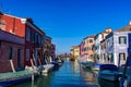 Burano island, famous for its colorful fishermen`s houses, in Venice