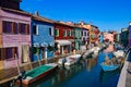 Burano island, famous for its colorful fishermen`s houses, in Venice