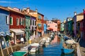 Burano island, famous for its colorful fishermen`s houses, in Venice