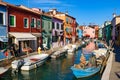 Burano island, famous for its colorful fishermen`s houses, in Venice