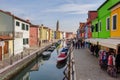 Burano island , small colored houses rand narrow canal