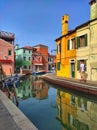 Burano, Italy - 06.30.2023: Venice landmark, Burano island canal