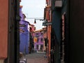 Burano Street with houses family colorful