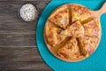 Burek Turkish pie. Lavash puff pie with cheese and sesame seeds. Top view