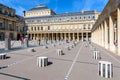 The Buren columns in the court of Honor of the Palais-Royal in Paris, France Royalty Free Stock Photo