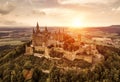 Burg Hohenzollern at sunset, Germany. This castle is famous landmark in Stuttgart vicinity. Landscape of Swabian Alps with Gothic Royalty Free Stock Photo