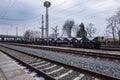 Burgas, Bulgaria - January 24, 2017 - Freight cargo train - black cars wagons - New 6-axled flat wagon - Type: Sahmmn - Model WW 6 Royalty Free Stock Photo