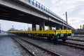 Burgas, Bulgaria - January 27, 2017 - Freight cargo train - yellow black New 4-axled flat cars wagons Type:Res Model:072-2- Transv