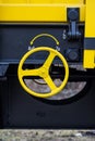 Burgas, Bulgaria - January 27, 2017 - Handbrake - yellow black New 4-axled flat cars wagons Type:Res Model:072-2- Transvagon AD