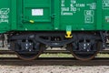 Burgas, Bulgaria - March 20, 2017 - Freight cargo train Wheels- 4axled box wagon green Type:Eanos Model:155-1 - Transvagon AD Royalty Free Stock Photo